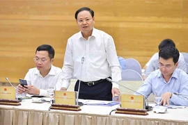 Deputy Minister of Natural Resources and Environment Le Minh Ngan speaks at the Government’s monthly meeting in Hanoi on May 4. (Photo: VNA)