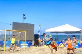 Players compete in the 2023 National Beach Handball Championship in October. The best one were selected to form the national team which will compete in the world championship next month in China. (Photo of VHF) 
