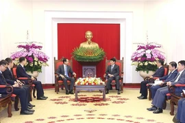 At the meeting between Politburo member and Permanent member of the Communist Party of Vietnam Central Committee's Secretariat Luong Cuong (right) and newly-appointed Chinese Ambassador to Vietnam He Wei. (Photo: VNA)