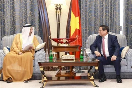 El primer ministro de Vietnam, Pham Minh Chinh, y el ministro de Inversiones de Arabia Saudita, Khalid bin Abdulaziz Al-Falih. (Fuente: VNA)