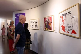 漫画展介绍43位西班牙画家的43件作品和19位越南画家的21件作品。图自越通社