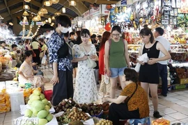 胡志明市中心的槟城市场。图自越通社