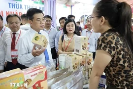 Visitors at the event showcasing the quintessence of craft villages and regional specialties 2024 in HCM City. (Photo: VNA)