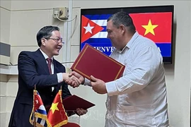 越南农民协会与古巴小农协会签署2025-2030年阶段合作谅解备忘录。图自越通社