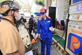Petrol prices down in latest adjustment (Photo: VNA)