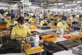 Production at handbag manufacturer Simone Vietnam Co Ltd's factory in Long An province (Photo: VNA)
