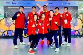 Vietnamese boxers and coaches pose with their medals of the Asian Amateur Boxing Championships 2024. (Photo: VNA) 