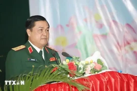 Political Commissar of the Vietnam National Defence Academy Lieut. Gen. Do Van Banh speaks at the event on December 12. (Photo: VNA)