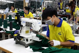 Garment production at Maxport Garment Company in Nam Dinh province. (Photo: VNA)