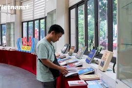 Meticulous work behind Vietnamese history book in pictures