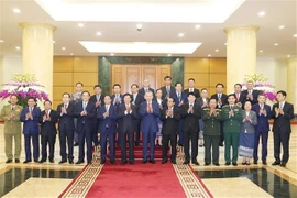 Vietnamese, Lao top leaders co-chair high-level Party meeting