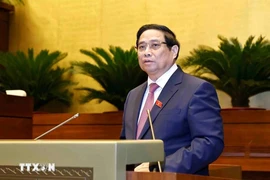 El primer ministro de Vietnam, Pham Minh Chinh, habla en el octavo periodo de sesiones de la Asamblea Nacional de la XV legislatura. (Fuente: VNA)