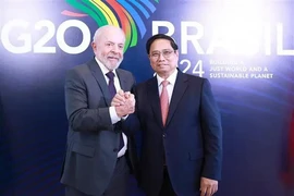 El primer ministro de Vietnam, Pham Minh Chinh, y el presidente de Brasil, Luiz Inácio Lula da Silva. (Fuente: VNA)