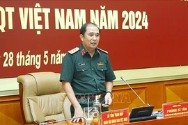 Генерал-полковник Фунг Ши Тан выступает на мероприятии. (Фото: ВИA)