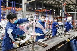 Экономический рост Вьетнама будет обусловлен восстановлением экспортного сектора, сильными прямыми иностранными инвестициями и политической поддержкой, заявил МВФ. (Фото: ВИА) 