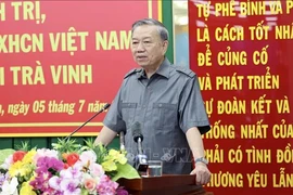 Президент То Лам выступает на встрече с официальными лицами провинции Чавинь 5 июля. (Фото: ВИA)