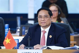 El primer ministro de Vietnam, Pham Minh Chinh, presentó un discurso durante un debate sobre desarrollo sostenible y transición energética en el marco de la Cumbre del G20 en Rio de Janeiro, Brasil (Fuente: VNA)