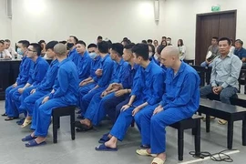 Les accusés lors de leur procès devant le Tribunal populaire de Hanoi. Photo: VNA