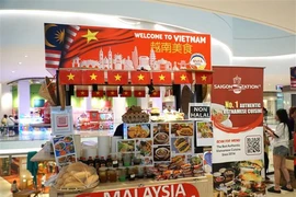 Un stand présentant les plats pho de l'entreprise Sai Gon Station. Photo : VNA