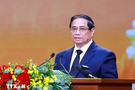 Le Premier ministre Pham Minh Chinh lors de la conférence. Photo: VNA