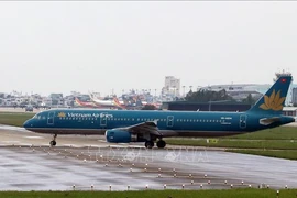 Un avion de Vietnam Airlines à l’aéroport international de Dà Nang. Photo d'archives: VNA