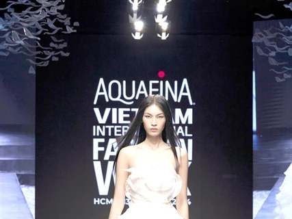 Huynh Tu Anh, winner of The Face Vietnam 2023, in a dress by designer Vo Cong Khanh, who will open the AVIFW 2024 with his latest collection called “Kiet Tac Cua Nuoc” (Masterpiece of Water). (Photo courtesy of Multimedia JSC)