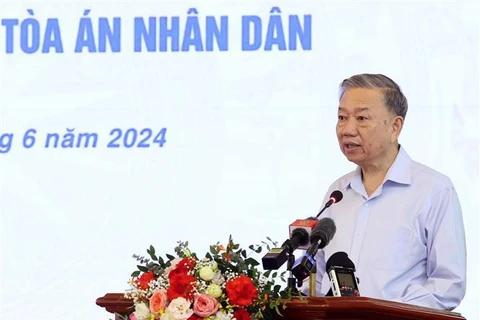 President To Lam addresses the meeting with the court system on June 14. (Photo: VNA)