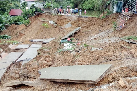 A road in Chi Lang ward of Lang Son city, Lang Son province, is eroded due to heavy rains on July 29 - 30. (Source: VNA)