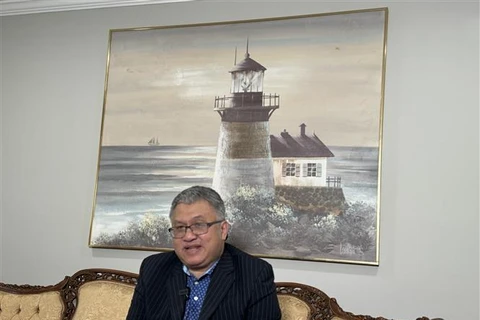 Lawyer Trinh Quoc Thien grants an interview to the Vietnam News Agency at his home. (Photo: VNA)