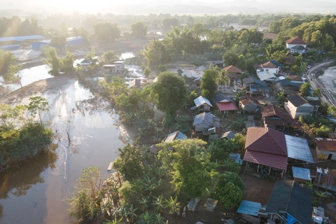 Part of Mai village in Luang Namtha district, Luang Namtha province, Laos, is flooded after downpour triggered by Typhoon Yagi. (Photo: VNA)