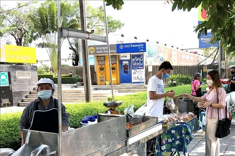 Vendors on a street in Bangkok, Thailand (Photo: VNA)