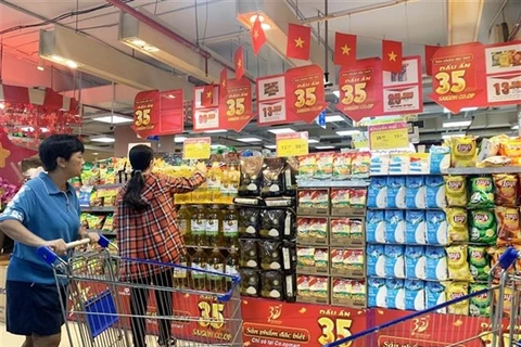 Shoppers at a Co-op supermarket in HCM City. (Photo: VNA)