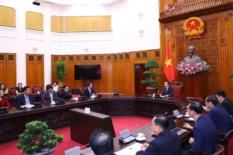 Le vice-Premier ministre Tran Hong Ha reçoit le directeur général de Samsung Vietnam Choi Joo Ho, le 12 août à Hanoï. Photo: VNA