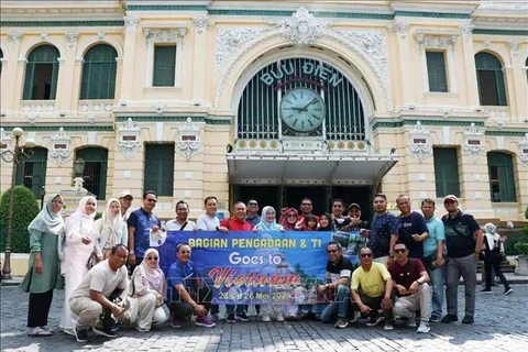 Turistas extranjeros en Ciudad Ho Chi Minh. (Fuente: VNA)