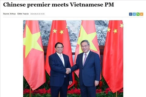 L'Agence de presse Xinhua et la Télévision centrale de Chine couvrent de l'entretien entre le Premier ministre Pham Minh Chinh et son homologue chinois Li Qiang. Photo: VNA