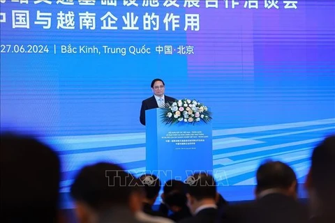 Vietnamese Prime Minister Pham Minh Chinh speaks at the conference in Beijing on June 27. (Photo: VNA)