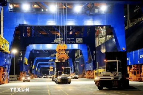 Transporting containers at Gemalink International Port, Phu My town, Ba Ria-Vung Tau province. (Photo: VNA)