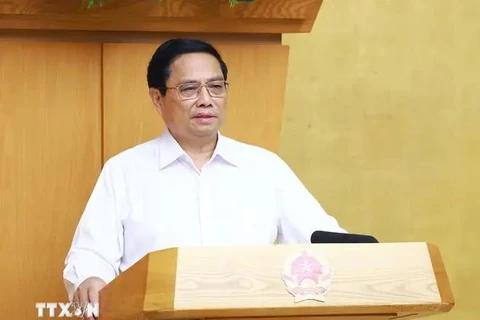 Prime Minister Pham Minh Chinh speaks at the session. (Photo: VNA)