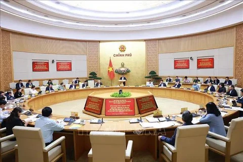 Government conference to carry out the review of the implementation of Resolution No. 18-NQ/TW, which seeks to streamline the political system for greater efficiency (Photo: VNA)