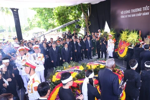 越共中央总书记阮富仲追悼会和安葬仪式隆重举行