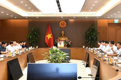 Deputy Prime Minister Le Minh Khai speaks at a meeting discussing gold market management measures in Hanoi on May 14. (Source: baochinhphu.vn)