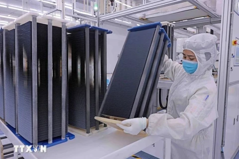 Production at a factory in Thai Nguyen province of the Chinese solar energy company Trina Solar. (Photo: VNA)