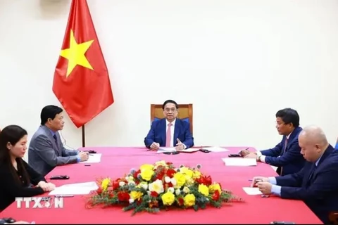 Prime Minister Pham Minh Chinh (centre) at a phone talks with his Thai counterpart Paetongtarn Shinawatra on August 29. (Photo: VNA)