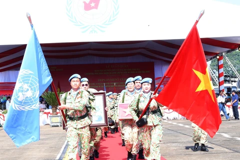 At the deployment ceremony for Level-2 Field Hospital Rotation 6 and Engineering Unit Rotation 3 in Hanoi on September 24 (Photo: VNA)