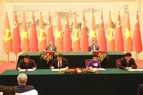 Vietnam y China firman 14 documentos de cooperación (Parte 2)