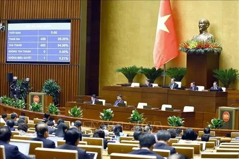 Diputados de la Asamblea Nacional votan a favor de la Ley de Planificación Urbana y Rural. (Foto: VNA)