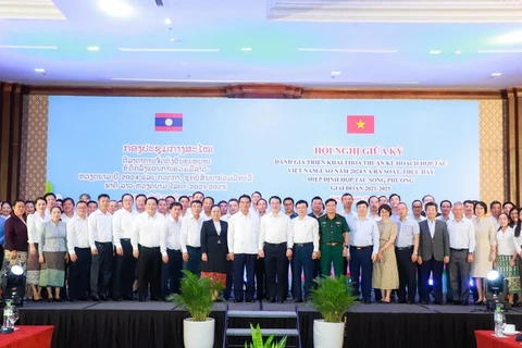 Vietnamese enterprises have to date invested in 256 projects in Laos, with a total registered capital of 5.5 billion USD (Photo: VietnamPlus