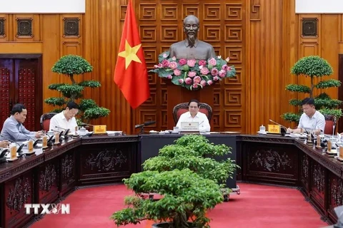 会议场景。图自越通社