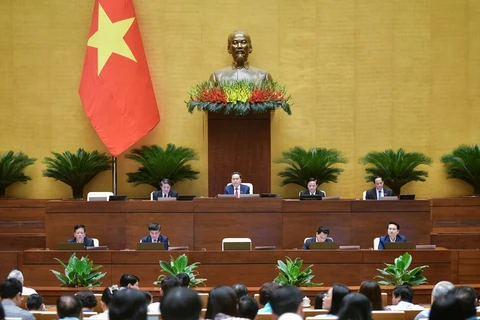 NA deputies question Cabinet members on auditing, culture, sports and tourism issues on June 5 (Photo: VNA)