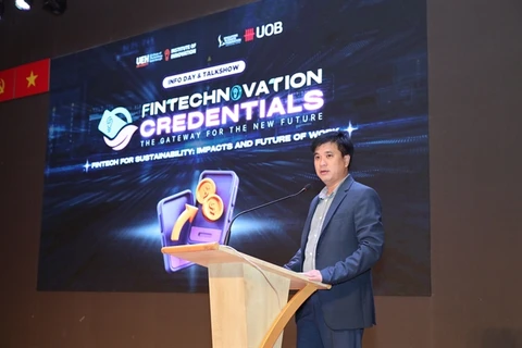 Associate Professor Bui Quang Hung, deputy director of the University of Economics HCM City, introduces FinTechNovation Credentials, a collaborative initiative spearheaded by the university and United Overseas Bank (UOB) Vietnam, at an information day held on June 7. (Photo courtesy of UEH)